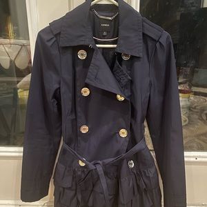 Navy blue pea coat with ruffle.